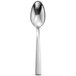 A close-up of a Sant'Andrea Elevation stainless steel demitasse spoon with a silver handle.