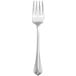 A close up of a silver Oneida salad fork with a white background.