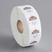 A roll of white paper with brown and white Noble Products Thursday 1" clock labels with white text.