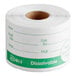 A roll of Noble Products 2" x 4" dissolvable green universal day of the week labels with spaces for item, shelf life, employee, use by, and manager information.