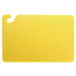 A yellow San Jamar Cut-N-Carry cutting board with a hook.