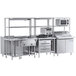 A stainless steel Chef's Counter serving line with dish cabinets.