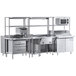A Chef's Counter serving line with a sandwich prep table, steam table, and dish cabinets.