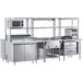 A Chef's Counter stainless steel preparation line in a commercial kitchen.