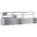 A Chef's Counter stainless steel work table with shelves and dish cabinets.