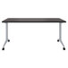 A weathered charcoal rectangular table with T-legs and wheels.