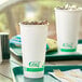A tray with two EcoChoice compostable paper cold cups filled with ice.