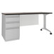A weathered charcoal and arctic silver Hirsh Industries teacher's desk with drawers.