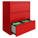 A Hirsh Industries lava red lateral file cabinet with three drawers, one open.