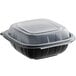 A black plastic container with a clear lid.