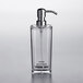 An American Metalcraft clear plastic square hand sanitizer dispenser with a stainless steel pump.