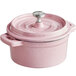 A pink Valor enameled cast iron pot with a lid and metal knob.