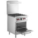 A stainless steel Vulcan commercial gas range with a Space Saver oven door open.