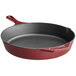 A red Valor enameled cast iron skillet with a helper handle.