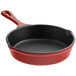 A Valor cranberry enameled cast iron skillet with a handle.