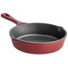 A red Valor enameled cast iron skillet with a handle.