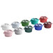 A group of six Valor enameled mini cast iron pots in different colors.
