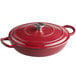 A red Valor enameled cast iron casserole dish with a lid.
