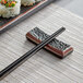 Acopa Heika Black Matte Textured Stoneware Chopstick Rest Main Thumbnail 1