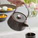 Acopa Heika 24 oz. Black Matte Textured Stoneware Teapot with Lid Main Thumbnail 1