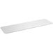 A white rectangular Regency Polyethylene cutting board insert for wire shelving.