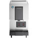 A Hoshizaki countertop ice maker and water dispenser with a black and grey cover.