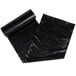 A roll of black Berry low density trash bags.