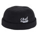 A black Chef Revival beanie with white text that says "Chef" on a counter.