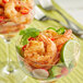 A shrimp and avocado salad seasoned with McCormick Peruvian seasoning in a glass.