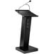 A black Oklahoma Sound lectern with a microphone on top.