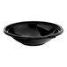 A black Visions PET plastic serving bowl with a black rim on a white table.