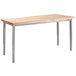 A National Public Seating utility table with maple butcher block top and gray metal legs.