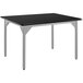 A rectangular black National Public Seating utility table with silver legs.