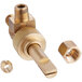 A gold brass ServIt valve with a nut.