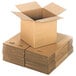 A stack of Lavex Kraft cardboard shipping boxes.