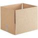 A Lavex kraft cardboard shipping box with a cut out corner on a brown surface.