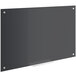 A Dynamic by 360 Office Furniture black glass dry erase board with silver screws.