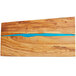 An American Metalcraft olive wood serving board with a blue polyresin streak.
