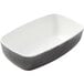 A white rectangular melamine bowl with a black and grey speckled design.