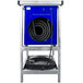 A blue King Electric portable outdoor-rated unit heater on a stand with a black coiled tube.