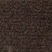 A close up of a dark toast brown carpet.
