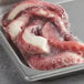 A tray of cooked Discefa octopus tentacles.