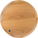 A BFM Seating round natural ash veneer wood table top with a metal circle in the center.