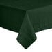A close-up of a Hoffmaster Hunter Green Cellutex table cover on a table.