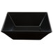 A black rectangular GET Siciliano square bowl with a lid on it.