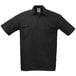 A black Mercer Culinary short sleeve work shirt with buttons and pockets.