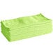 A stack of green Lavex microfiber cloths.