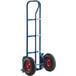 A blue hand truck with black wheels.
