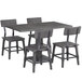 A Lancaster Table & Seating live edge dining table with four chairs.