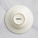 An ivory stoneware bowl with a circular rim.
